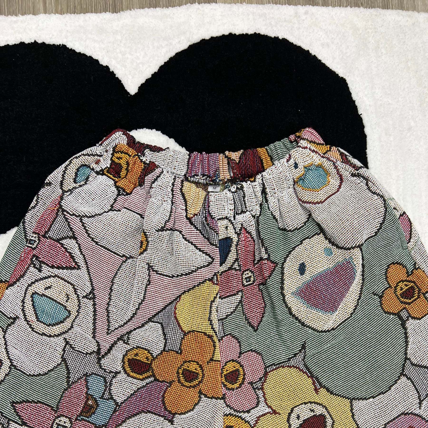 Trendy Blooms, Playful Vibes – Murakami Flower Themed Woven Shorts