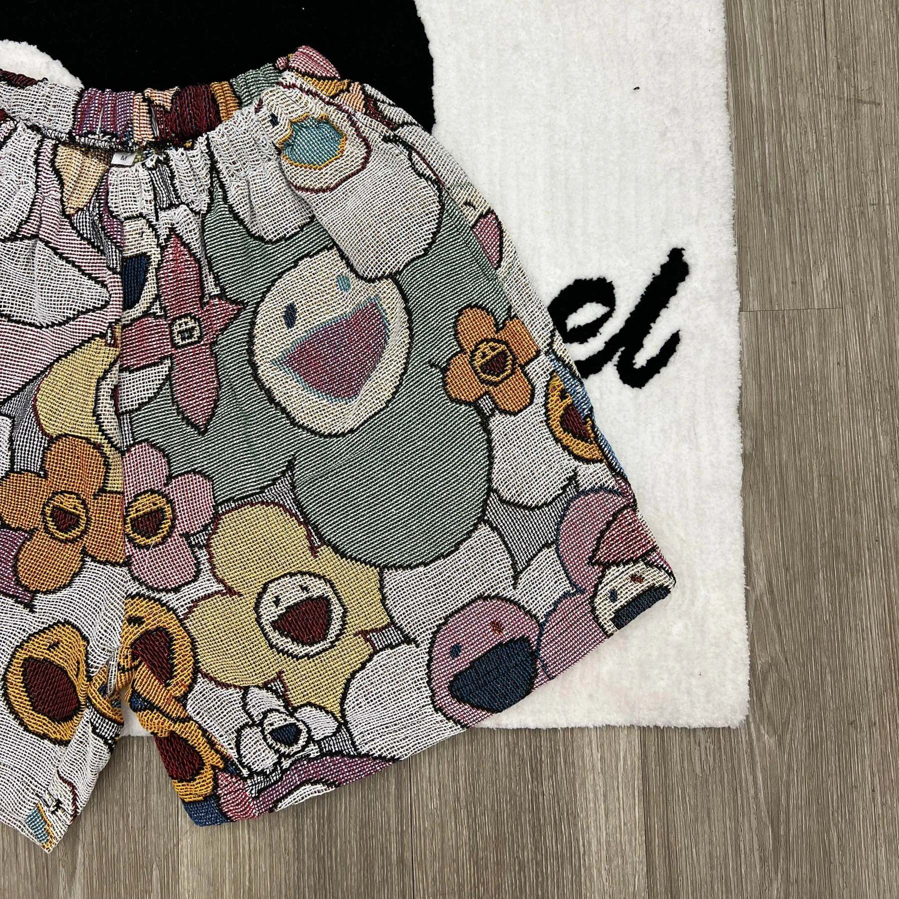 Trendy Blooms, Playful Vibes – Murakami Flower Themed Woven Shorts