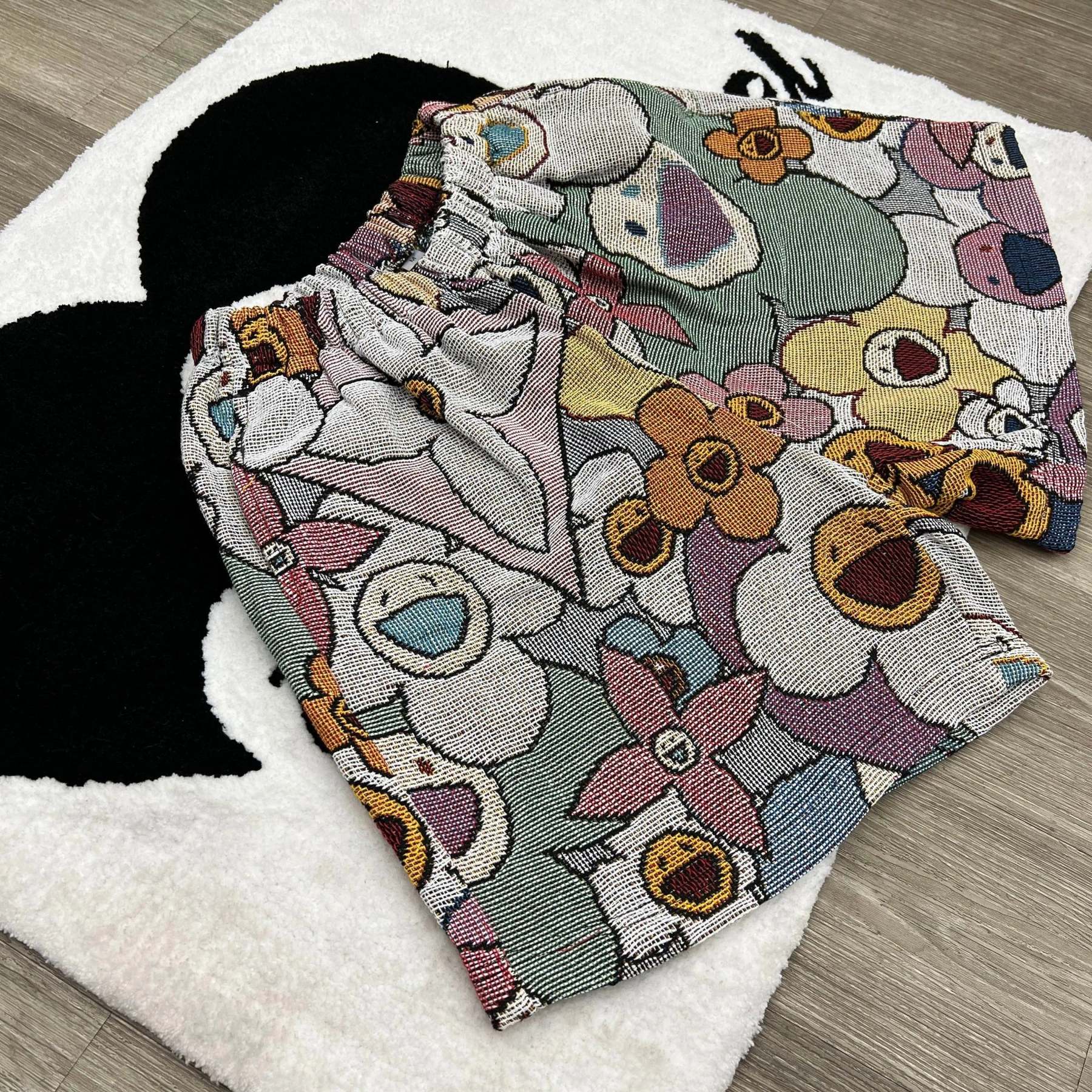 Trendy Blooms, Playful Vibes – Murakami Flower Themed Woven Shorts