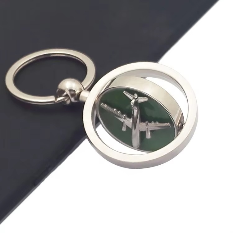 Round Rotating Airplane Keychain