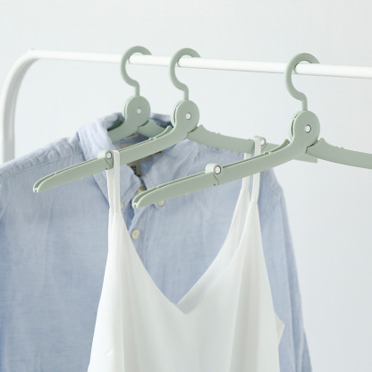 Self-designed travel folding clothes hanger
