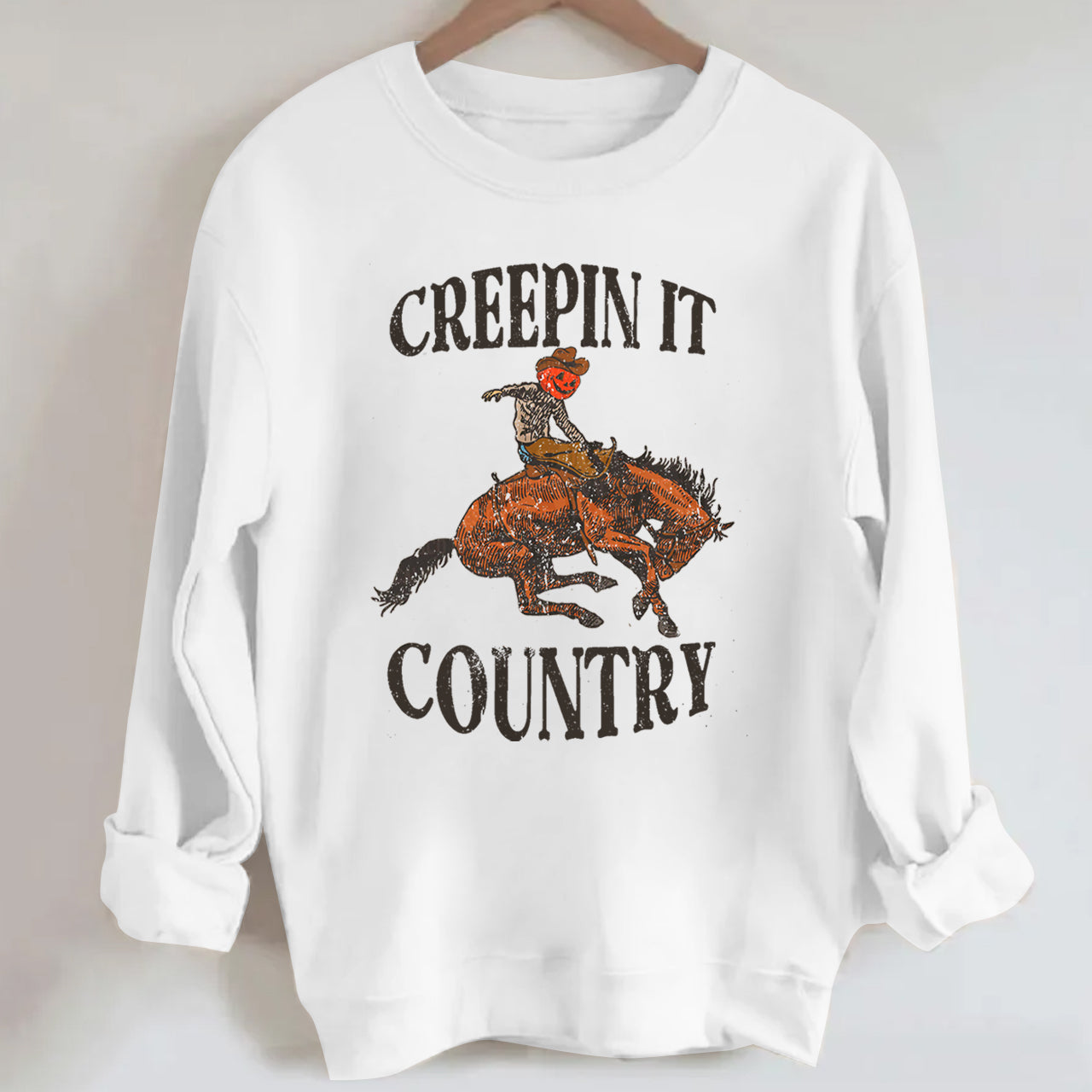 Pumpkin Cowboy Taming the Horse Sweatshirt