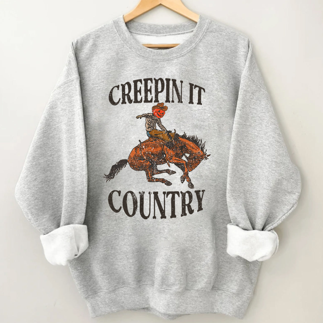 Pumpkin Cowboy Taming the Horse Sweatshirt