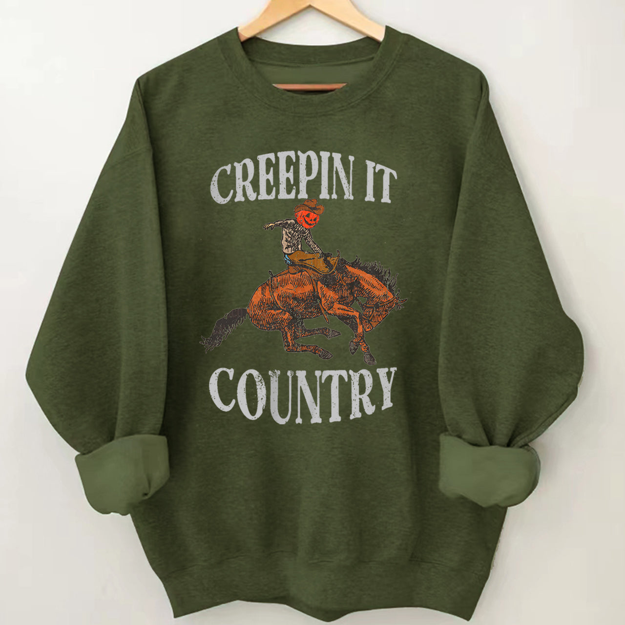 Pumpkin Cowboy Taming the Horse Sweatshirt