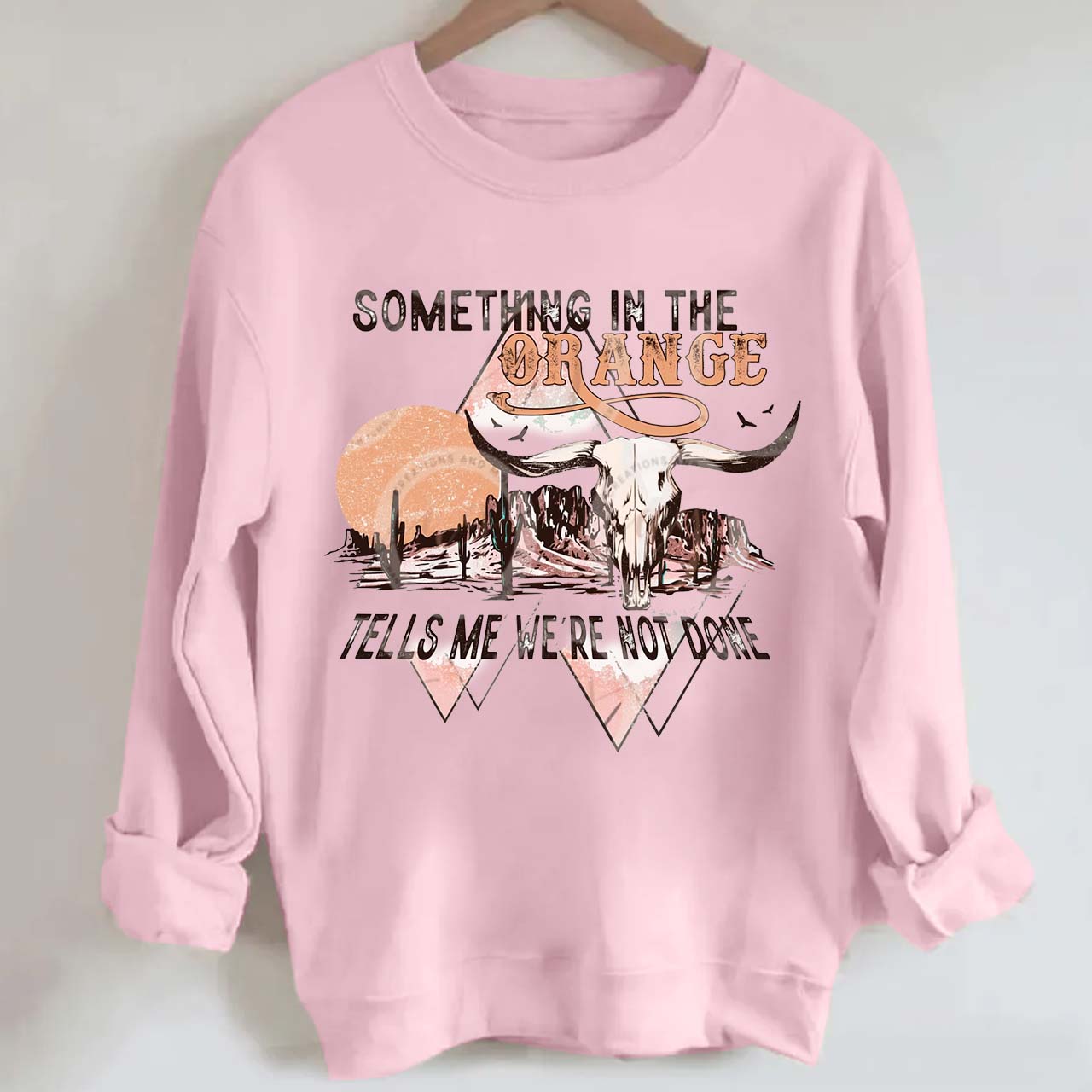 Tells We're Not Done Sweatshirt