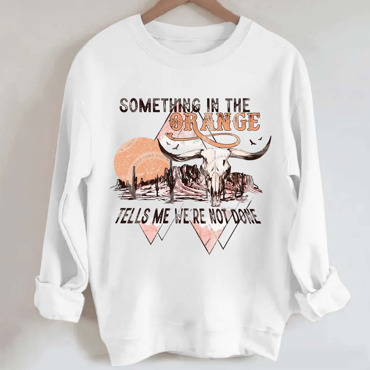 Tells We're Not Done Sweatshirt