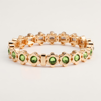 Gold Tone Flower Link Bracelet with Green Stones