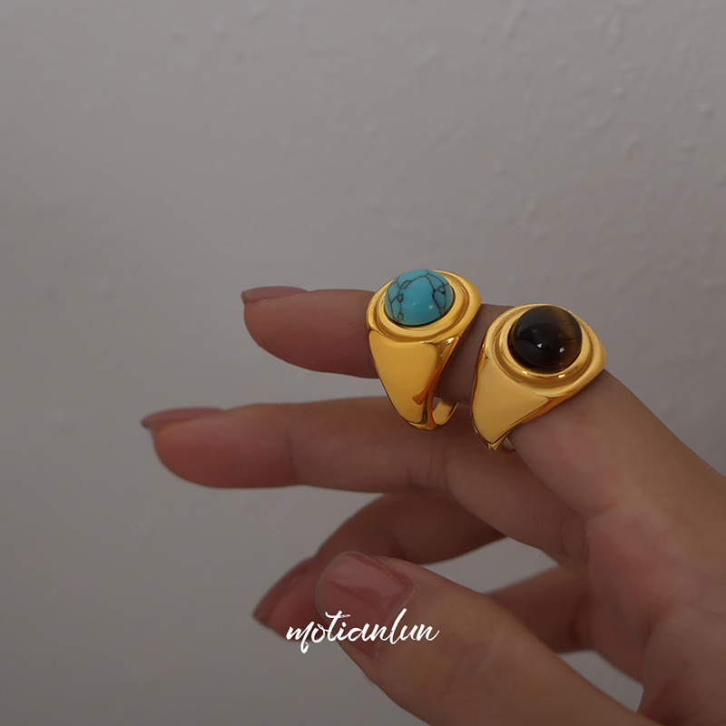 Inlaid with turquoise and cat's eye stone, gold-plated titanium steel ring
