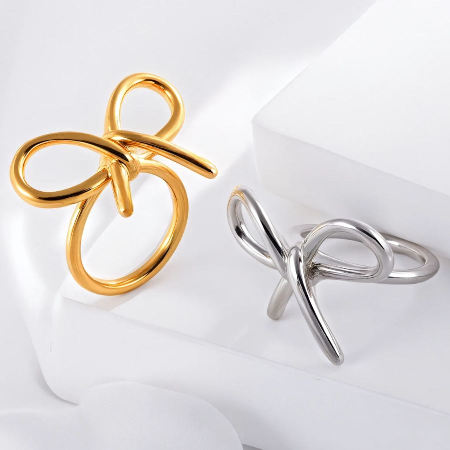 Anillo de acero inoxidable hueco para mujer con diseño de lazo simple y resistente al agua | N00657