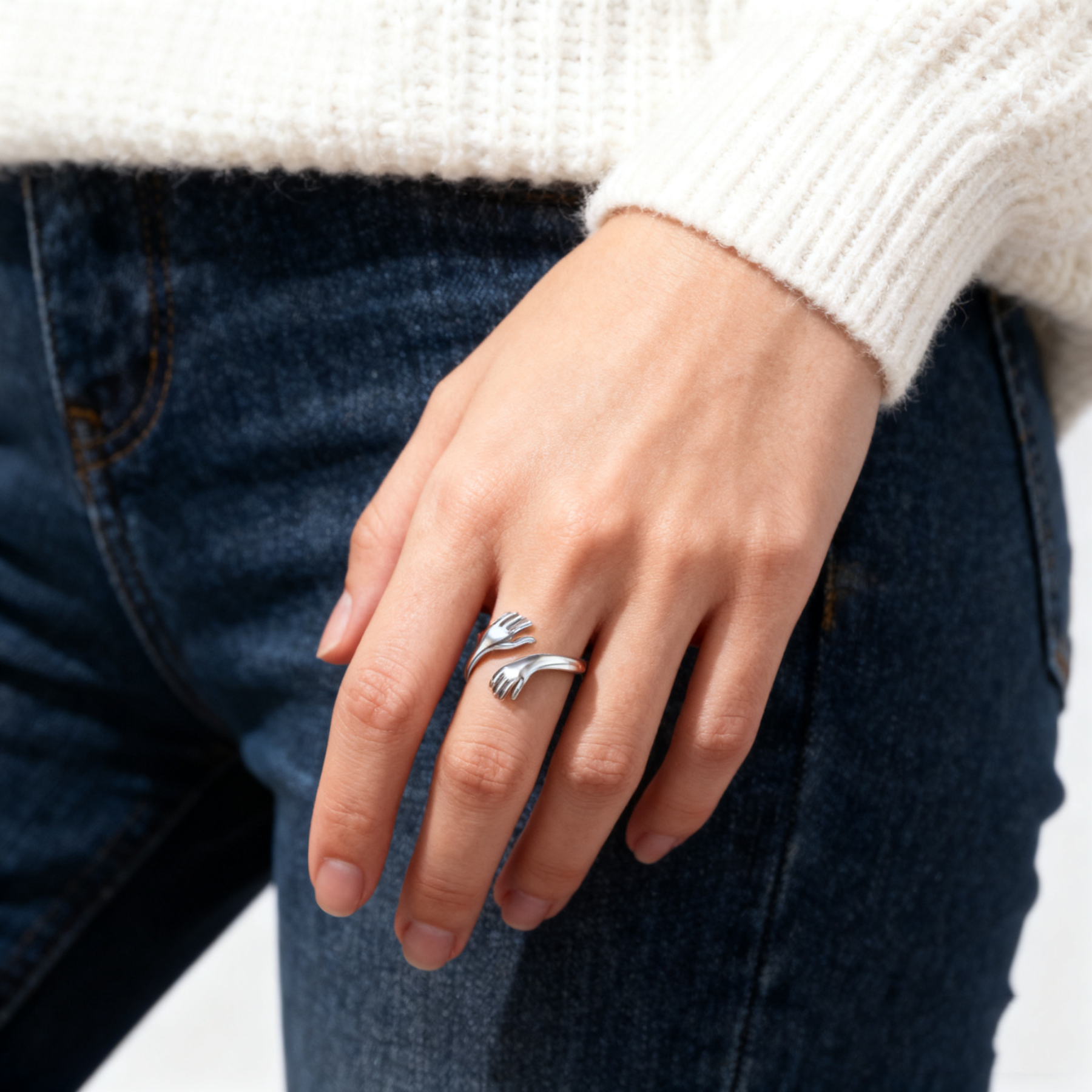 Embrace the engraved ring with both hands
