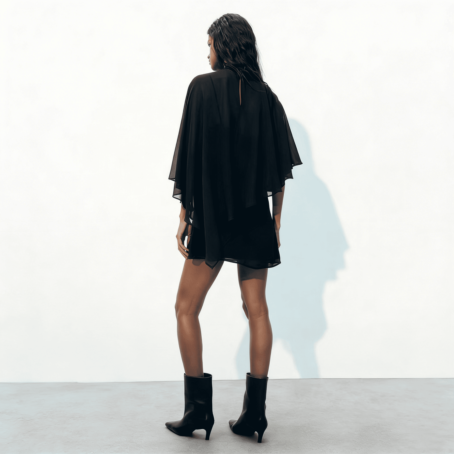 Cape-layered dress