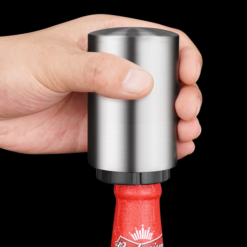 Automatic bottle opener with push button