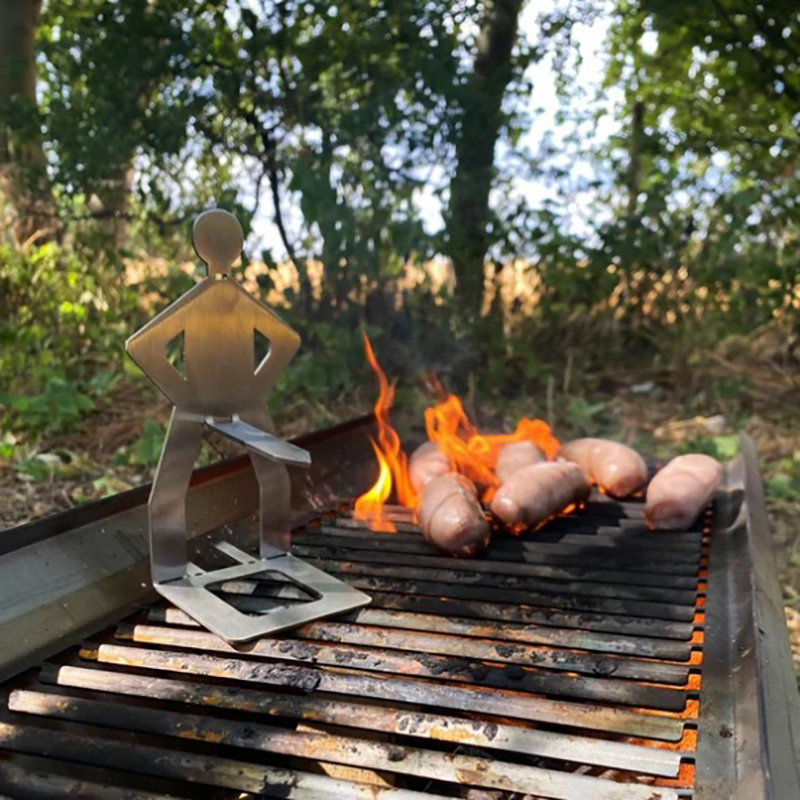 Outdoor human BBQ sausage rack