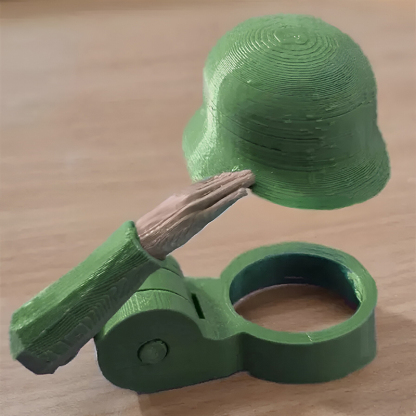 Soldier saluting beer bottle helmet
