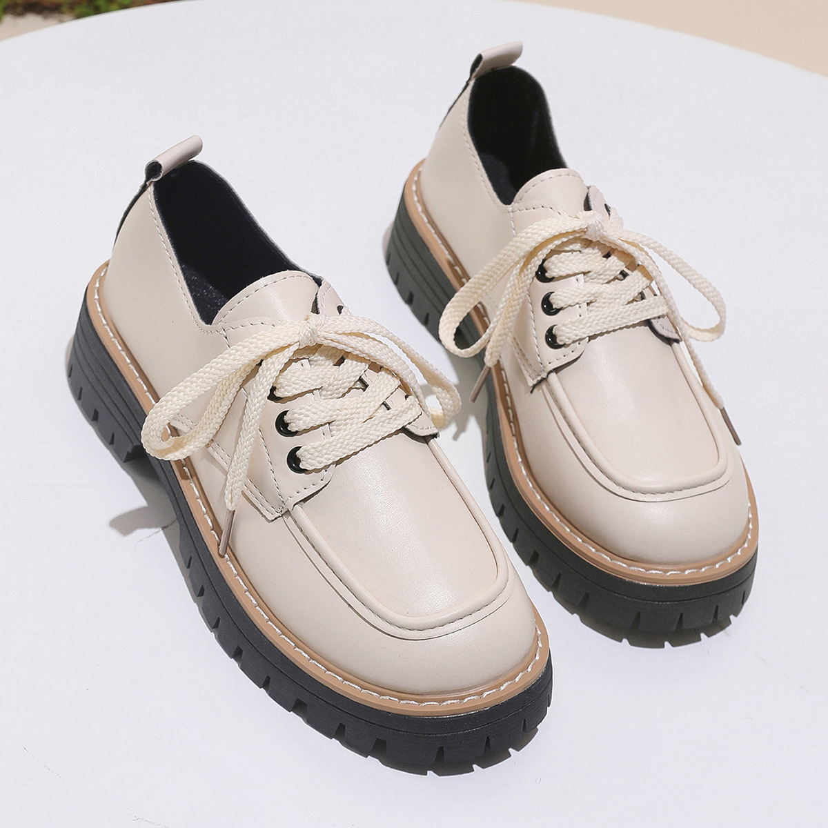 Round-toe lace-up loafers