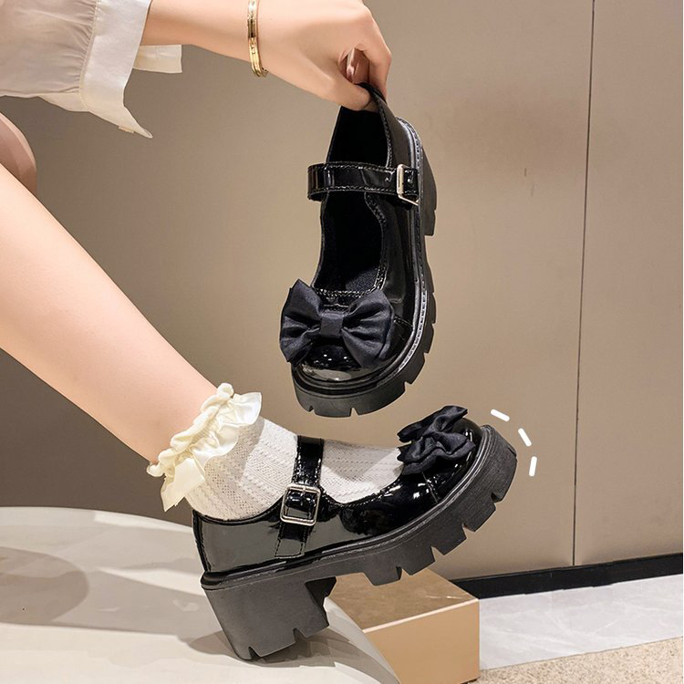 Platform Mary Jane shoes with bow