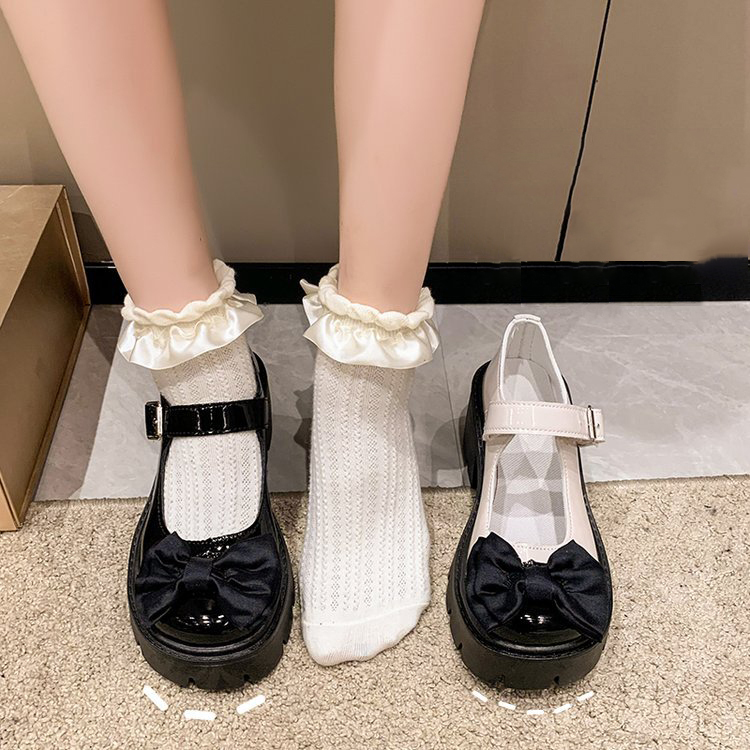 Platform Mary Jane shoes with bow