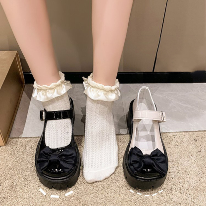 Platform Mary Jane shoes with bow