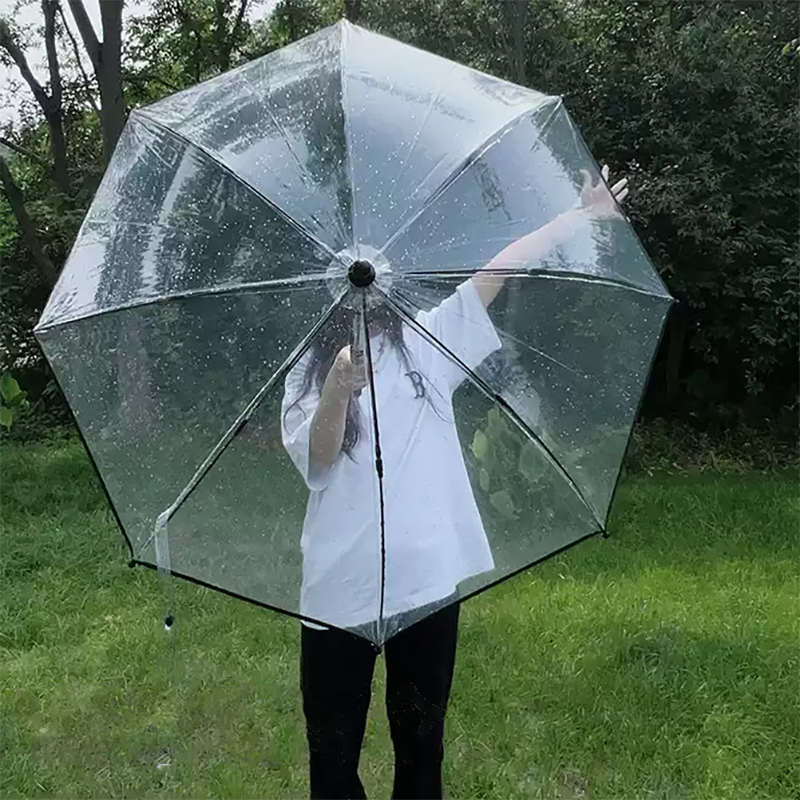 Transparent pull-out umbrella with water spray straight pole