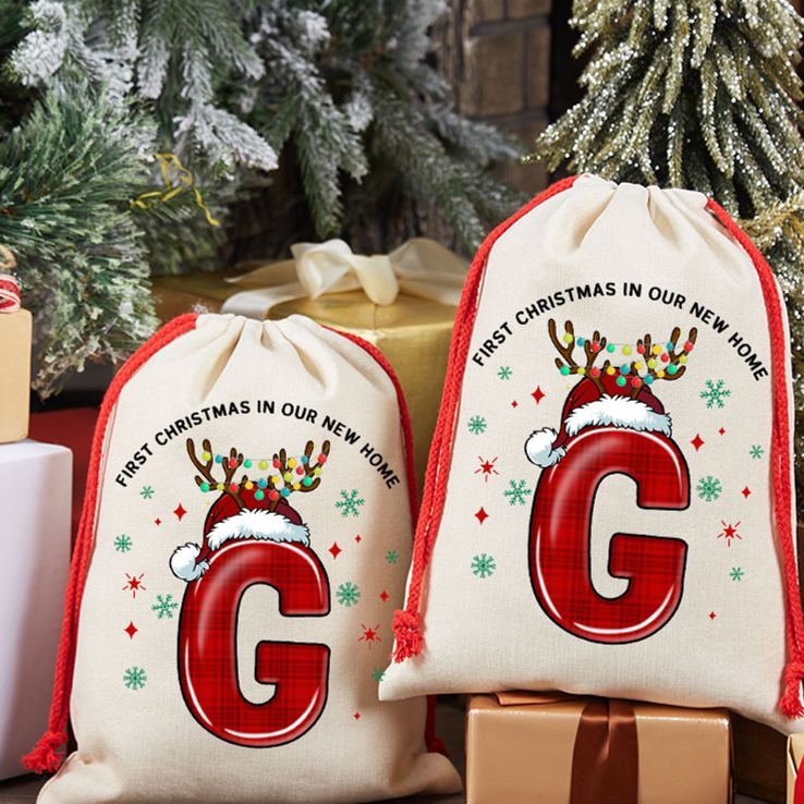 Personalized First Christmas in Our New Home Gift Bag Custom Christmas Sack with Initials Reindeer Design Holiday Decoration New Home Keepsake