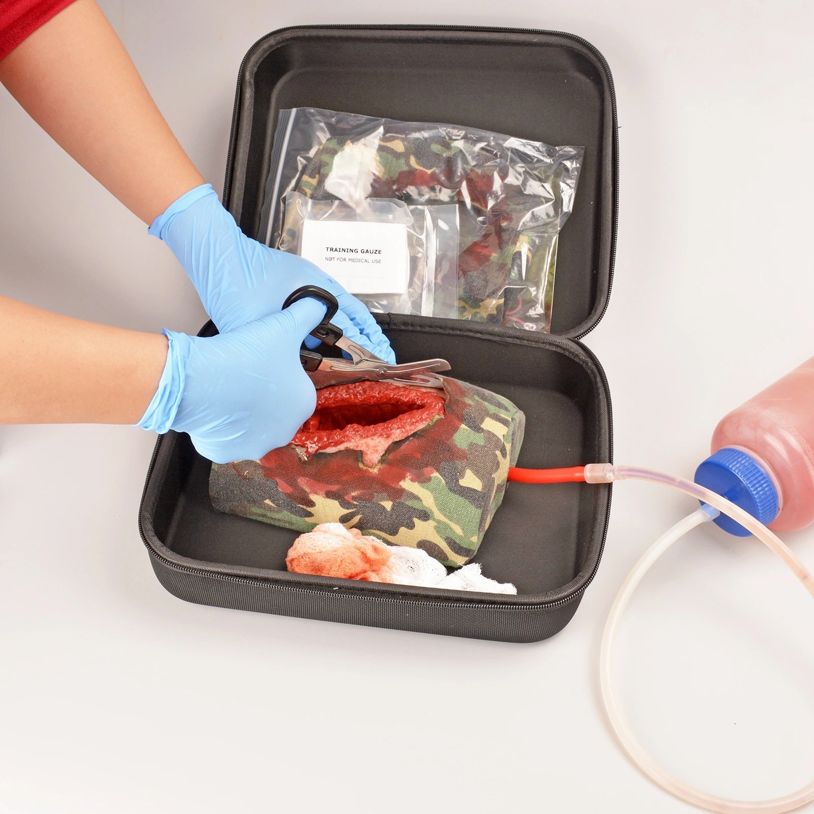 Thigh wound packing trainer Cover Cutting