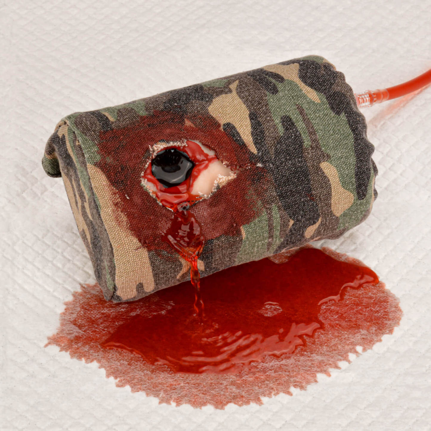 Covered GSW Wound Tourniquet Trainer with Bleeding