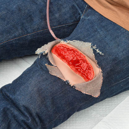 wearable thigh laceration hemostasis trainer