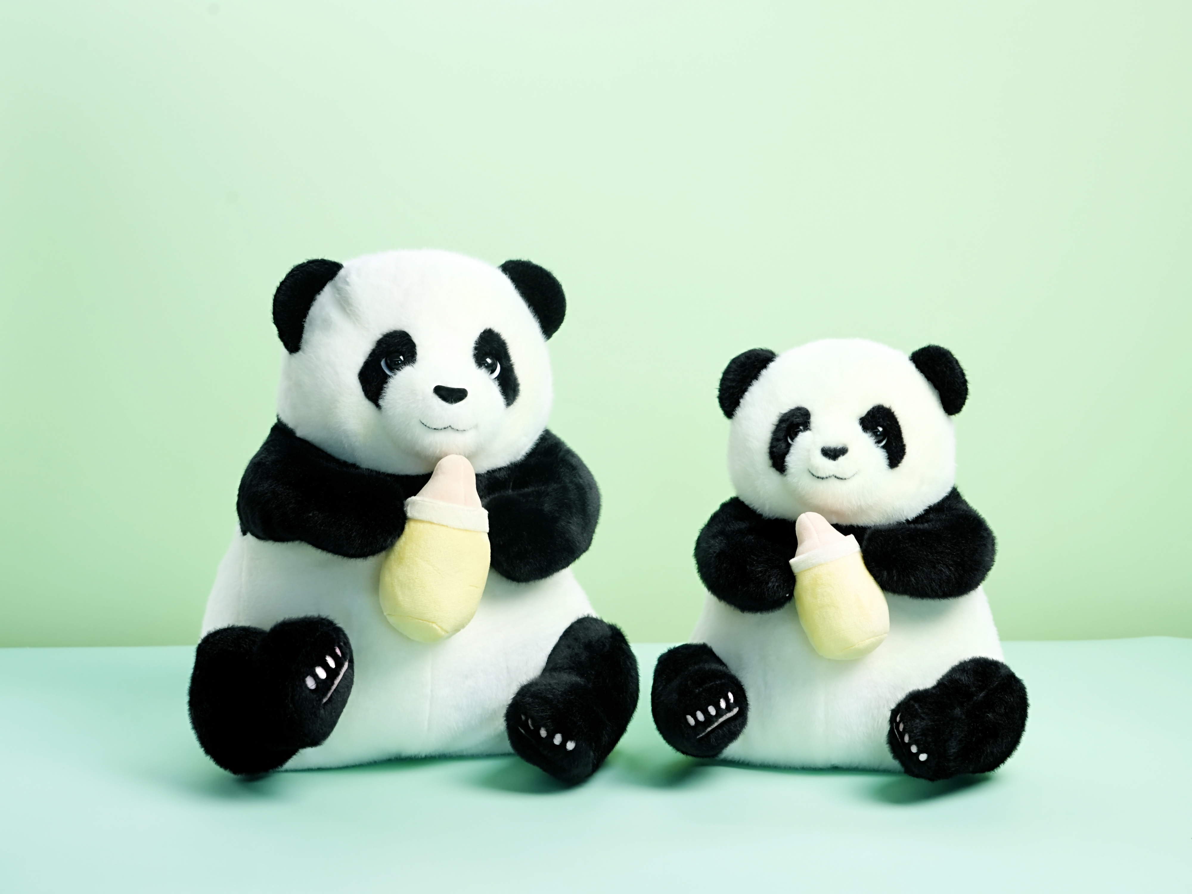 Panda Hugging Milk Bottle Plush Toy