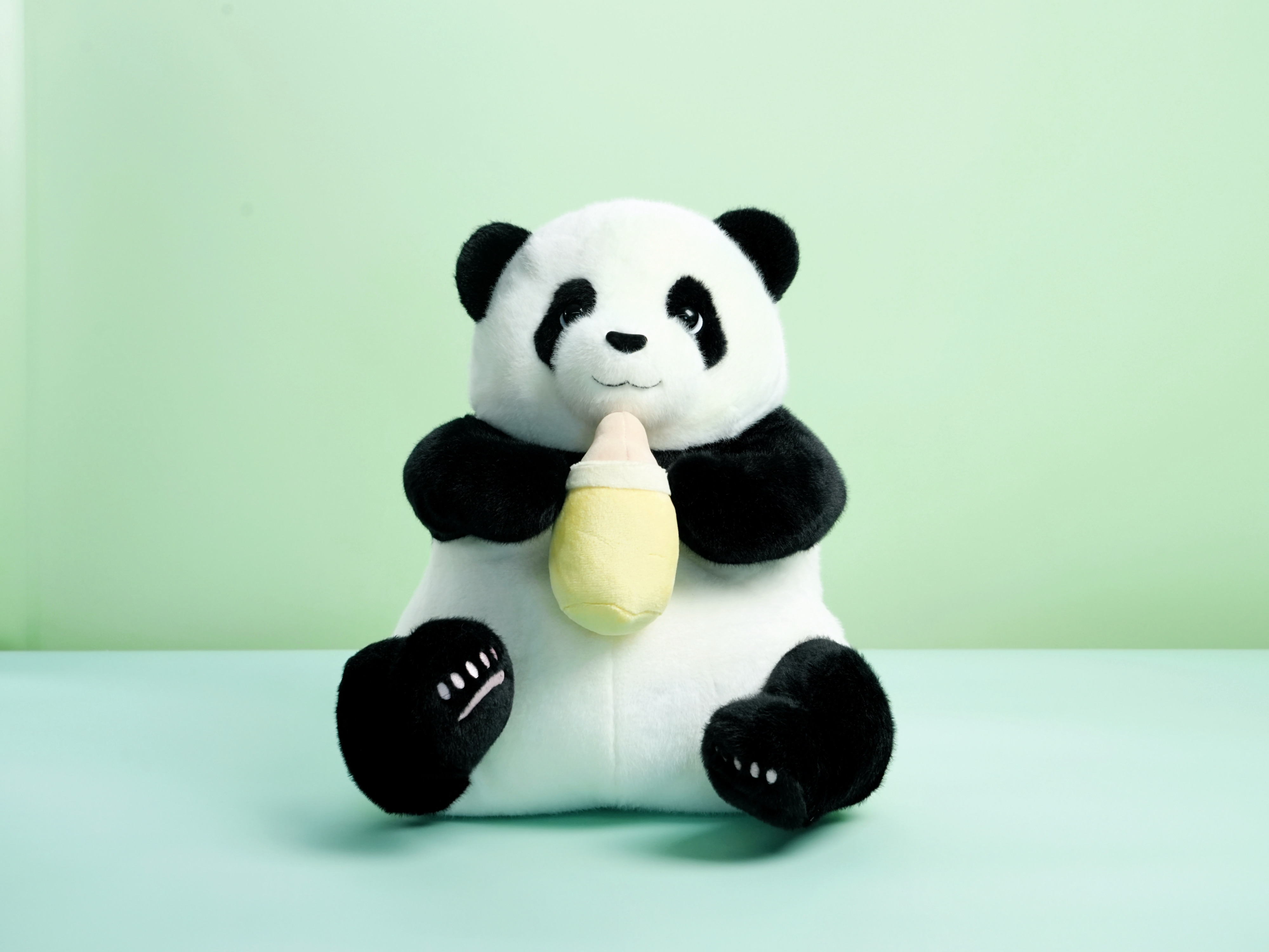 Panda Hugging Milk Bottle Plush Toy