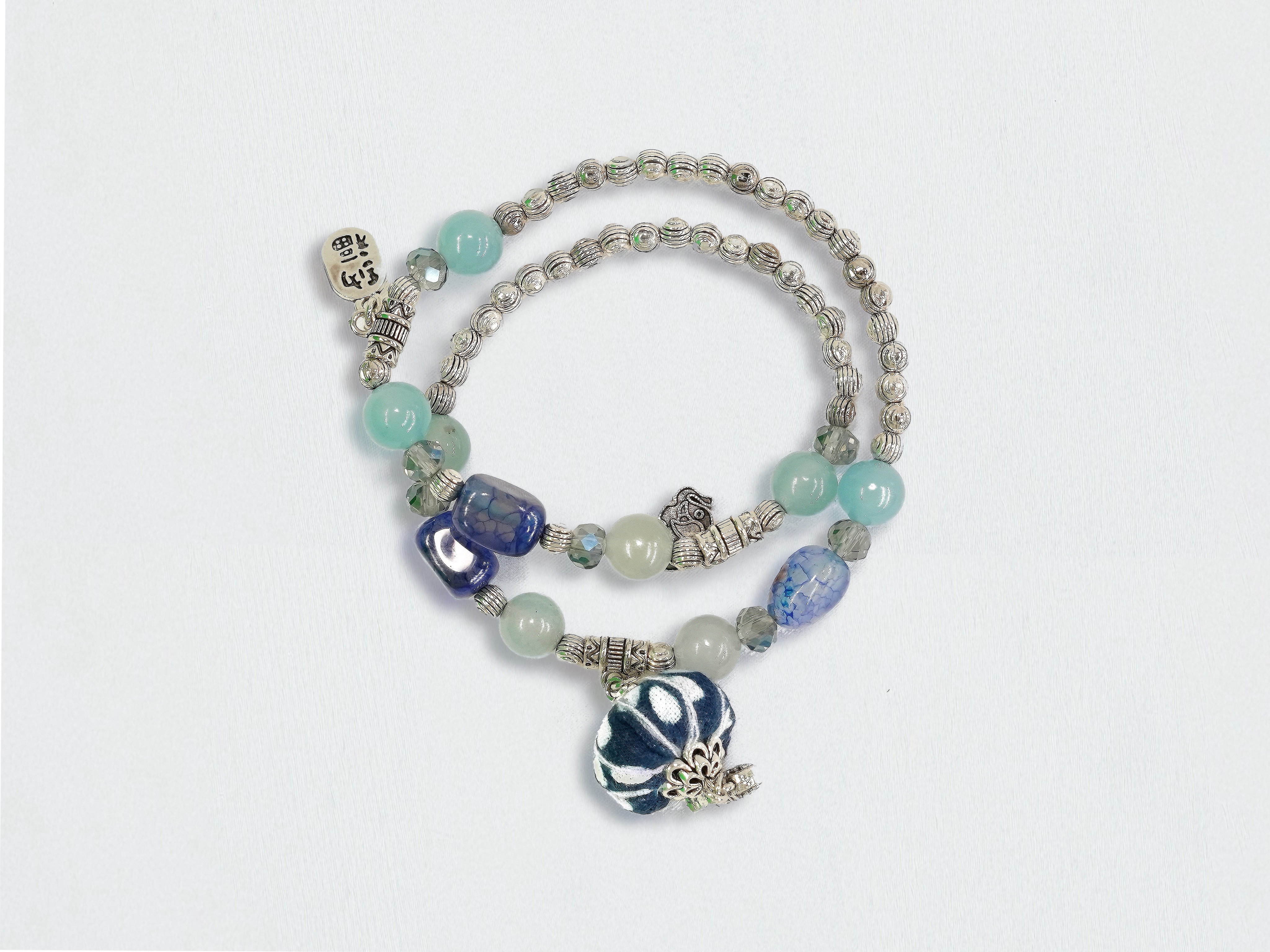 Indigo Whisper: Handmade Bracelet Inspired by Blue Calico