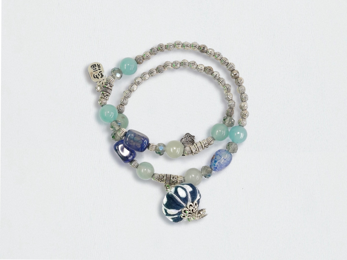 Indigo Whisper: Handmade Bracelet Inspired by Blue Calico