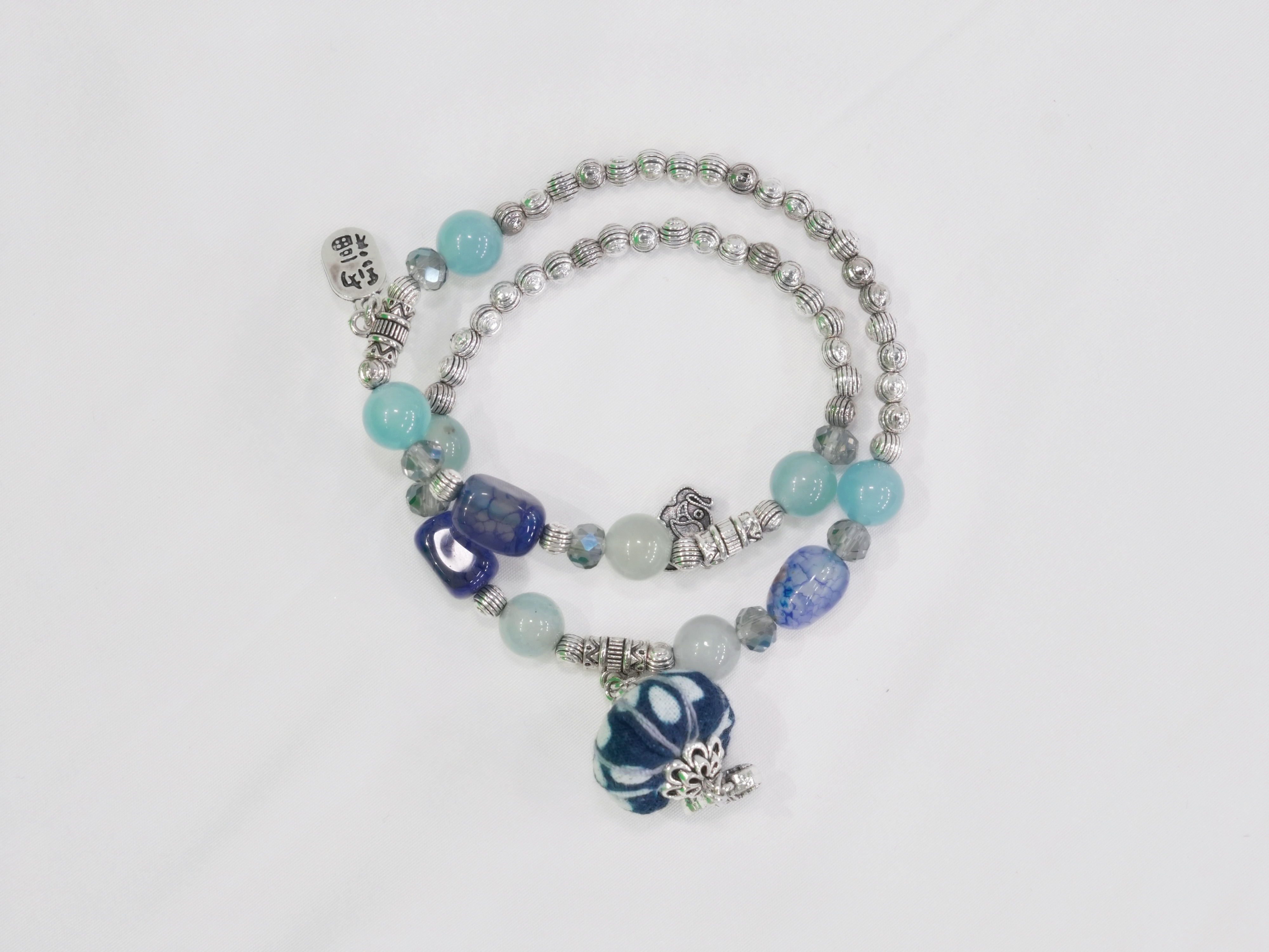 Indigo Whisper: Handmade Bracelet Inspired by Blue Calico