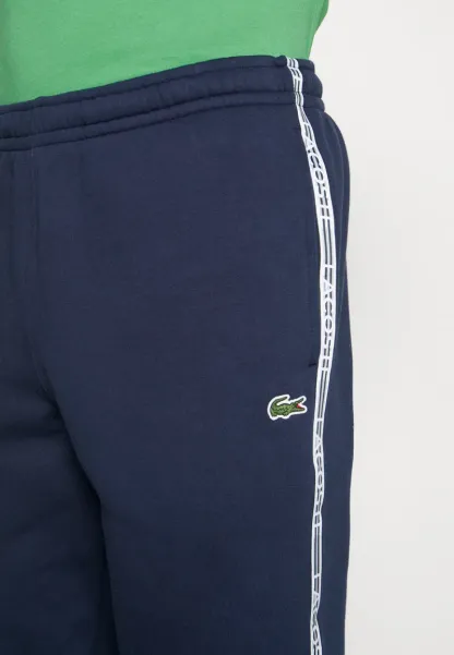 PANT TAPERED - Pantalon de survêtement - bleu marine