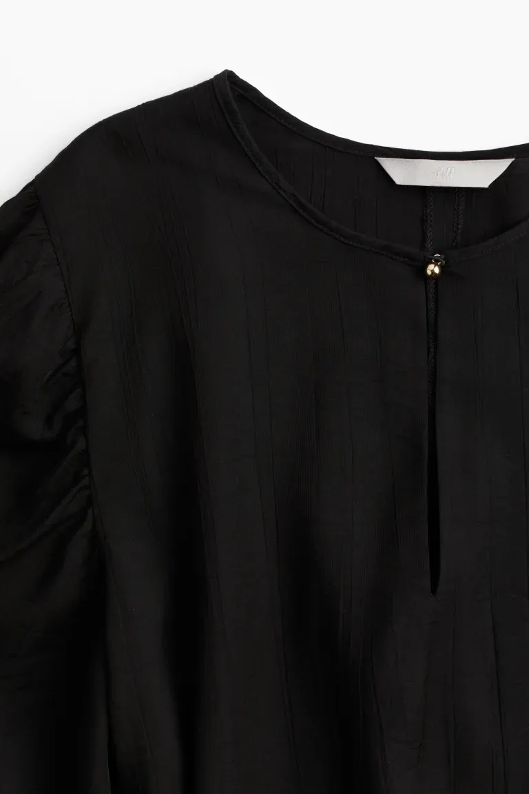 Robe à ceinture à nouer