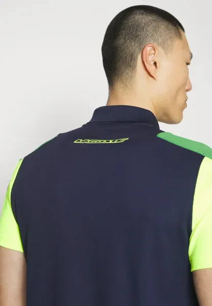 TENNIS - Polo - bleu marine/vert/jaune