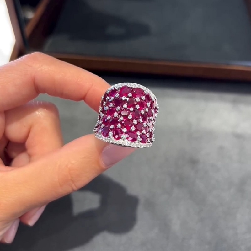 25.5CT Oval Shaped Ruby Saddle Ring with Diamond Prongs