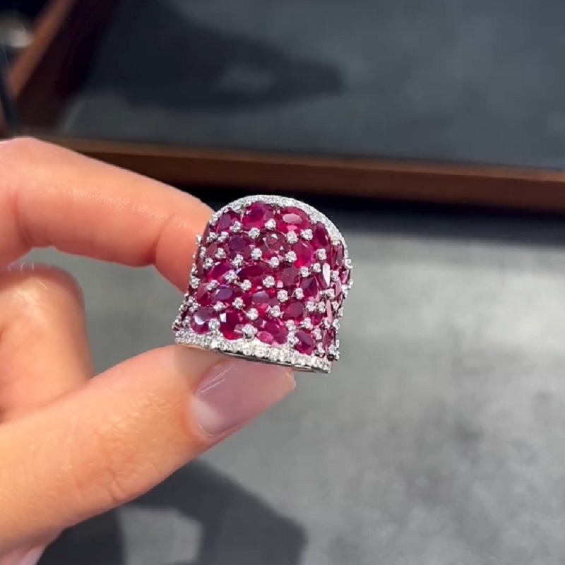 25.5CT Oval Shaped Ruby Saddle Ring with Diamond Prongs