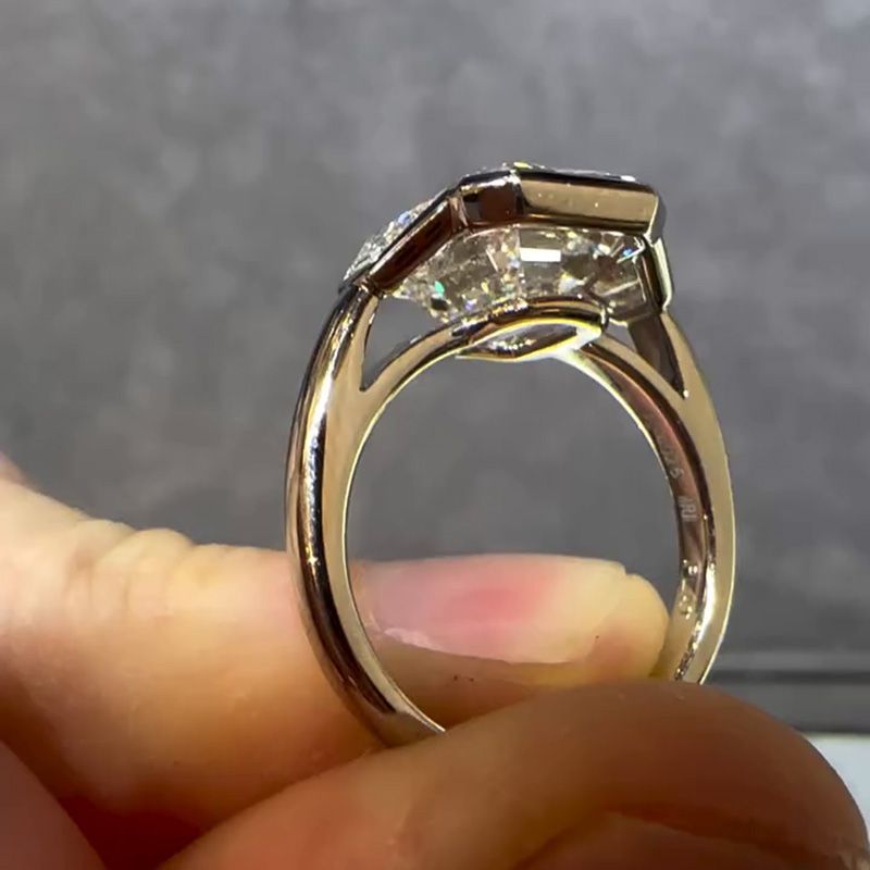 10ct Emerald Cut White Sapphire Three Stone Engagement Ring