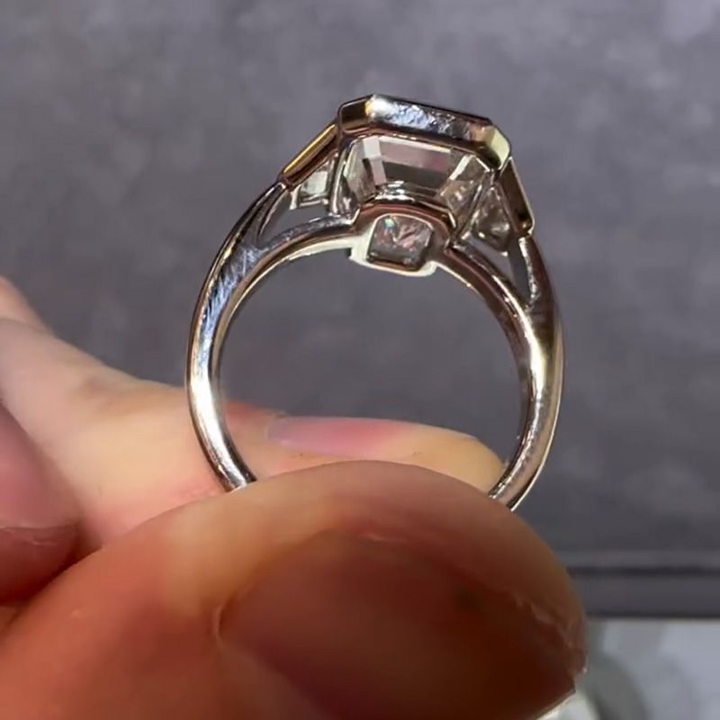 10ct Emerald Cut White Sapphire Three Stone Engagement Ring