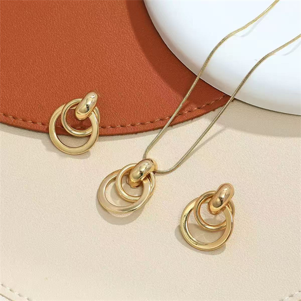 Stylish everyday wear, elegant and versatile, metal geometric circle necklace and earring set for women.