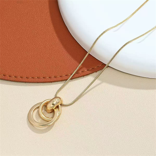 Stylish everyday wear, elegant and versatile, metal geometric circle necklace and earring set for women.