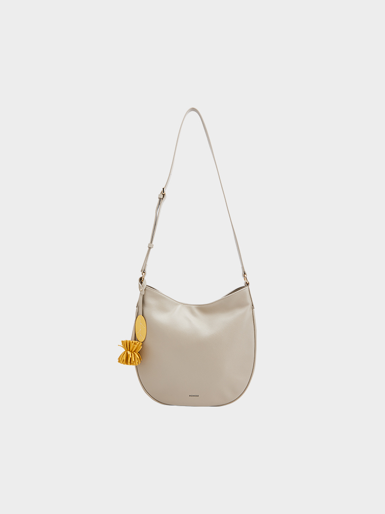 Single-shoulder semi-circular bag