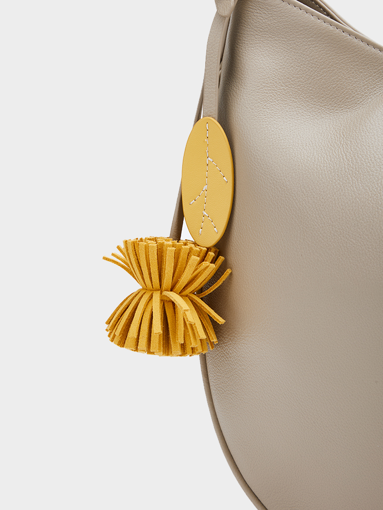 Single-shoulder semi-circular bag