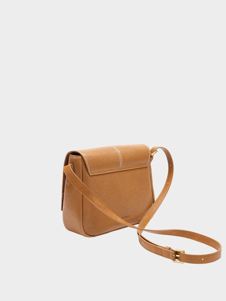 Vegetable-tanned cowhide crossbody bag