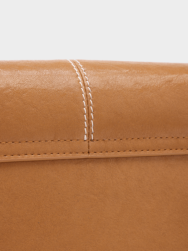 Vegetable-tanned cowhide crossbody bag
