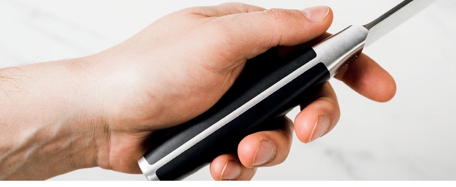 holding knife in hand