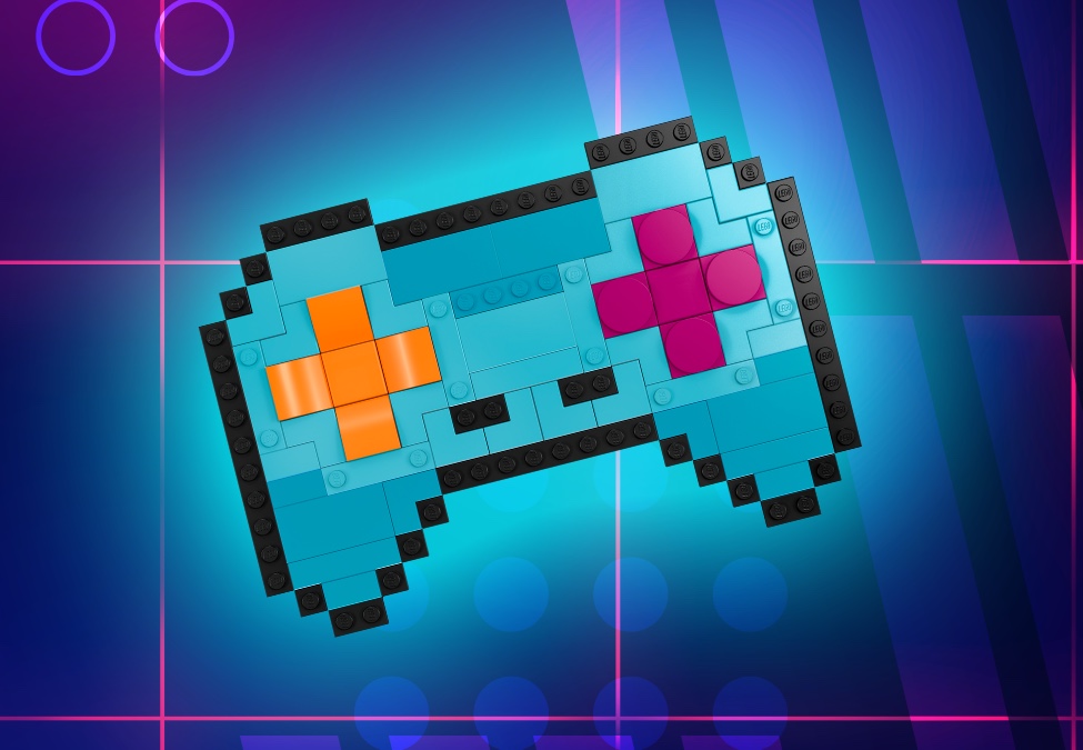 青色の背景に、ビデオゲームコントローラーのグラフィック