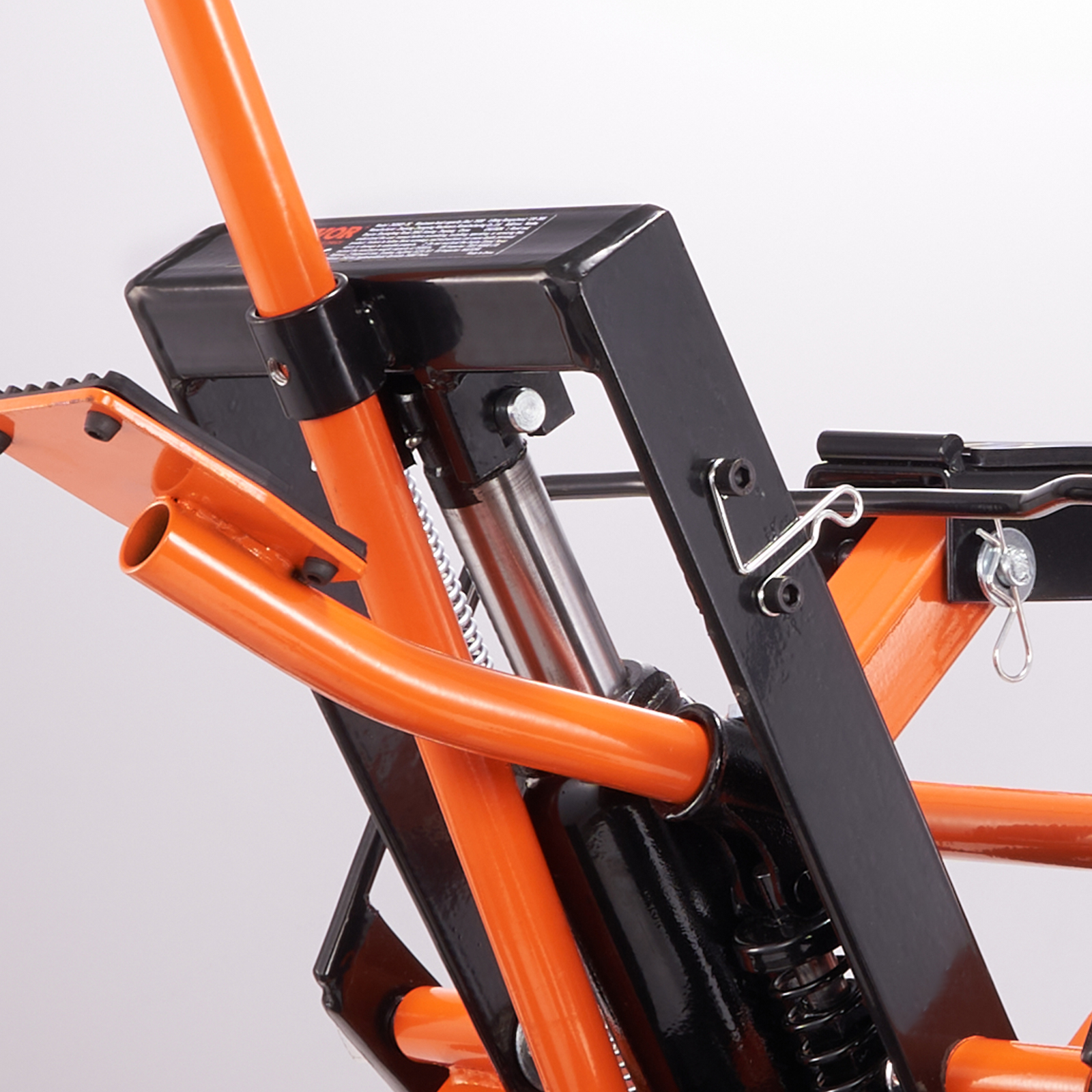 VEVOR motorcycle jack stand with black frame and orange handle, showcasing hydraulic components.