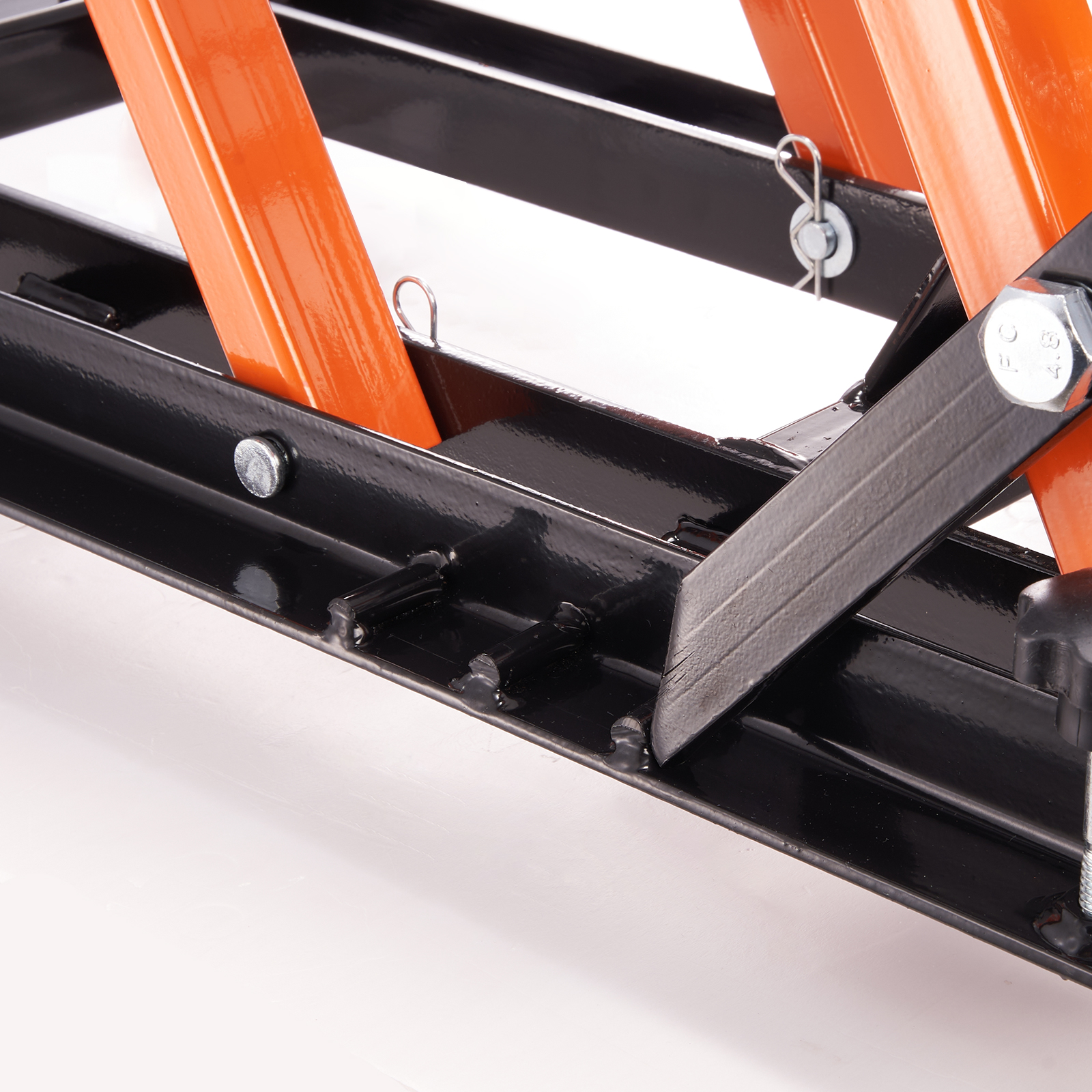 black and orange VEVOR motorcycle jack stand showcasing close-up of sturdy metal construction.
