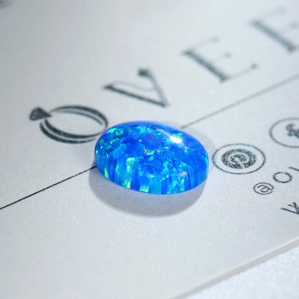 1.5 Carat Oval Cut Lab Grown Blue Opal Loose Stone